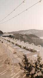 White Jackie O' Chairs - Santorini Catering by SpicyBites
